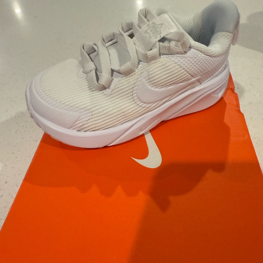 New, Never worn Nikes. Size 7C.